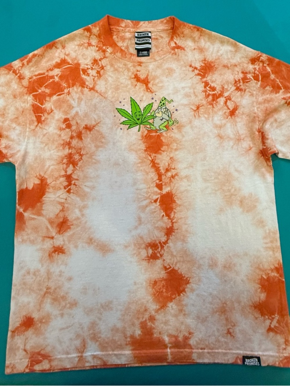 Broken Promises Orange Tie-Dye Short Sleeve Tee with Green Graphic